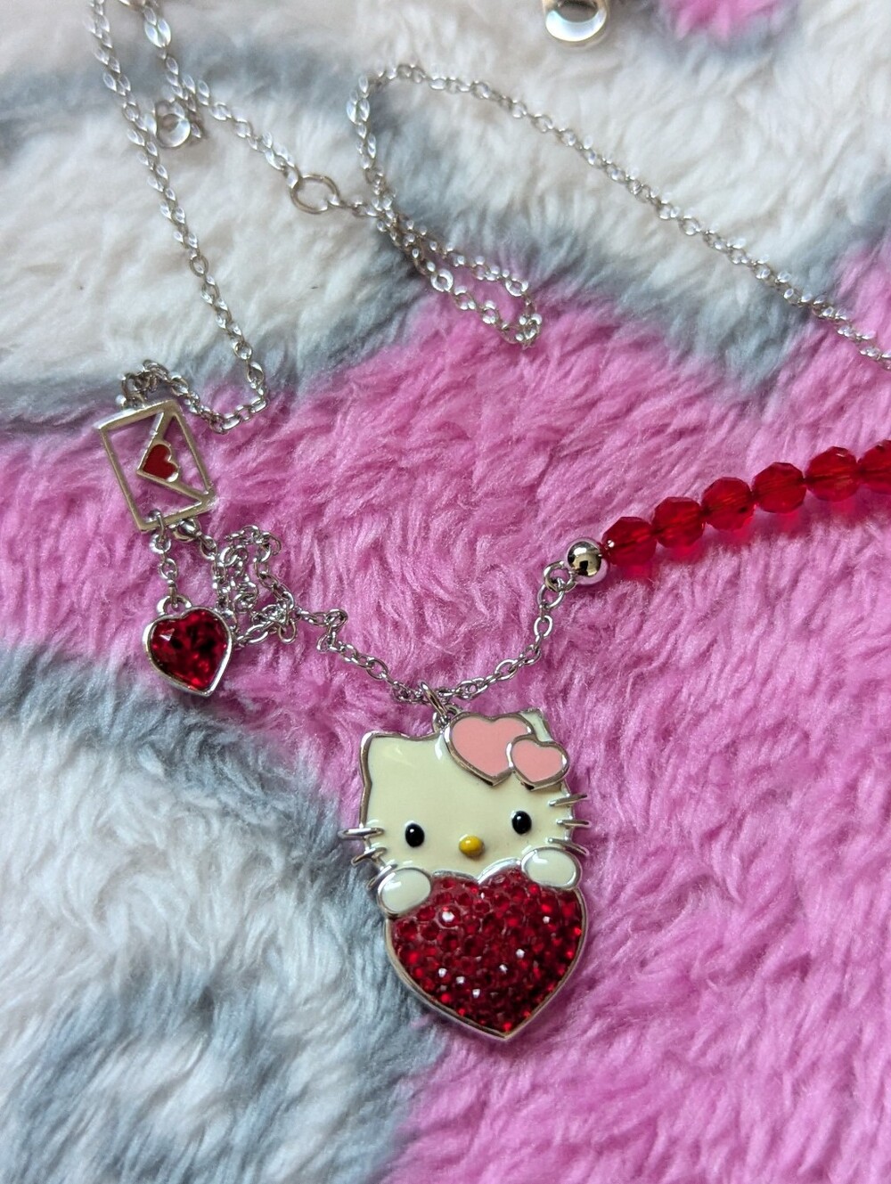 hello kitty x swarovski necklace hello kitty holding heart design Mail